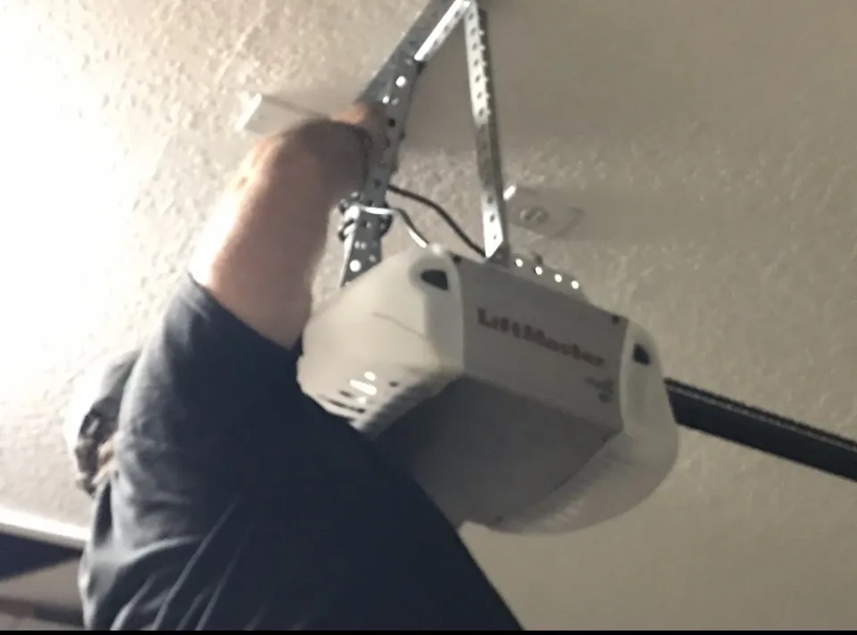 Smart garage door opener with keyless entry and remote access in a residential setting